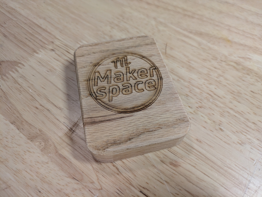 Phone holder made of white oak at the Toronto Tool Library maker space